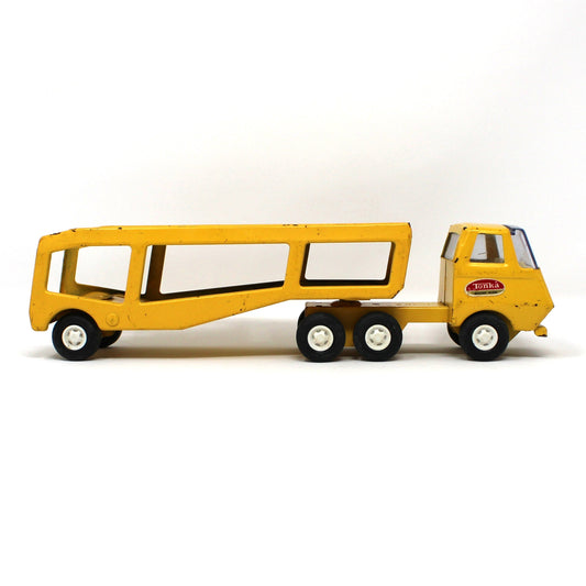 Side view of vintage toy Tonka, Car Carrier / Motor Mover, Yellow Pressed Steel