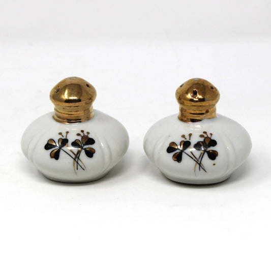 Salt and Pepper Shakers: Ucagco, Round Porcelain Gold Tops, Black / Gold Clovers, Vintage Japan, 1940s