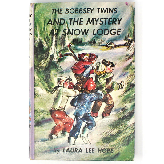 vintage children's book titled 'The Bobbsey Twins And The Mystery At Snow Lodge' showing illustrations of the Bobbsey twins and other characters in a snowy setting.
