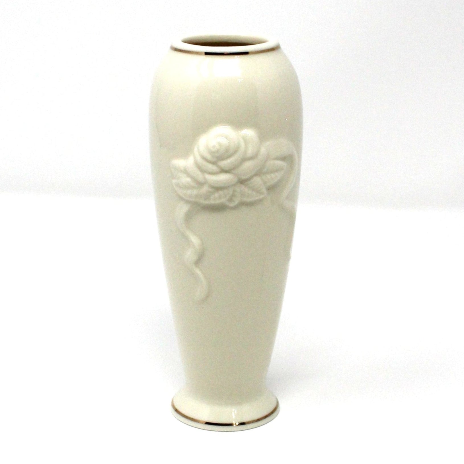A vintage Lenox Vase, Rose Bloom collection.  Cream color porcelain bud vase with embossed rose and 24KT gold trim.