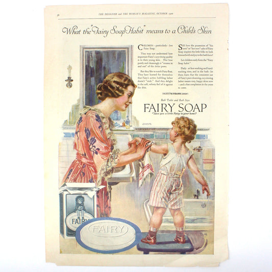 A vintage advertisement from 1920 for Fairy Soap, featuring an illustration of a mother and child with the Fairy Soap container prominently displayed.