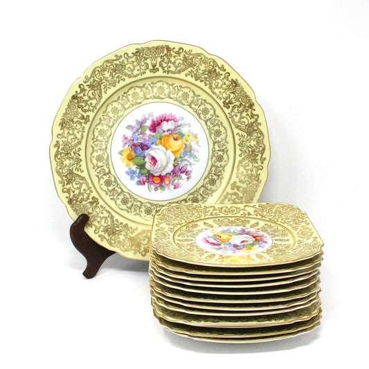 A set of Antique square dessert plates  with matching Cake Serving Plate.  Czechoslovakia porcelain with a floral center medallion and gold filigree.  13Pcs in all