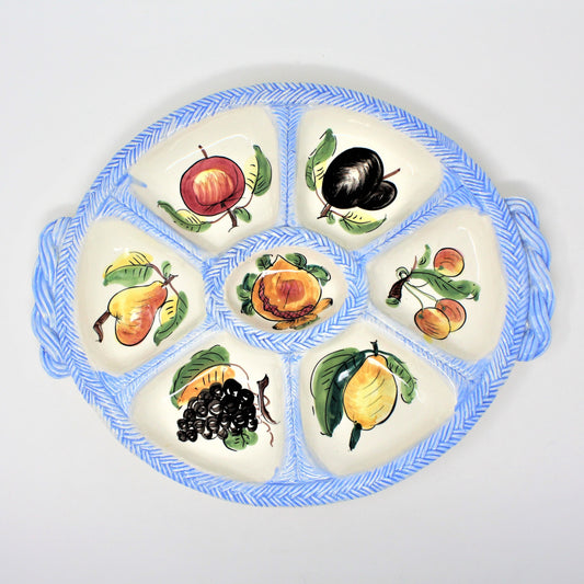 A hand painted Italian pottery, ceramic divided tray. Various fruits depicted in each section, rimmed with a blue 'rope-look' pattern and built-in handles.