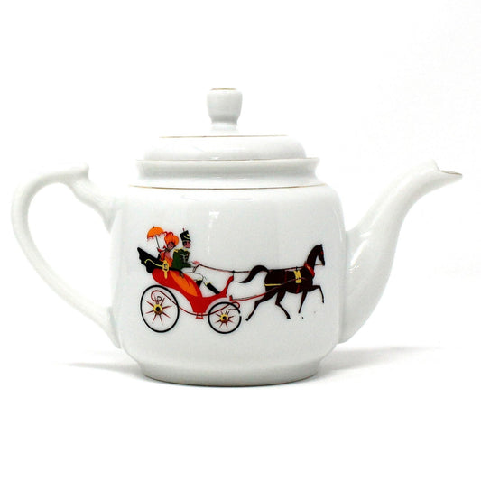 A vintage porcelain teapot with a design of a Victorian couple on a horse-drawn carriage, predominantly white with golden accents.