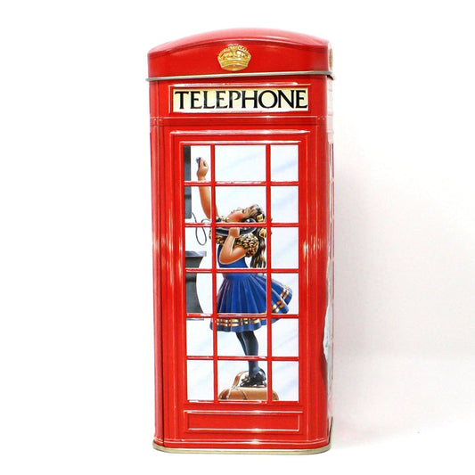 vintage tin coin bank. Shaped like a British Red telephone booth toy with a child figure using the telephone