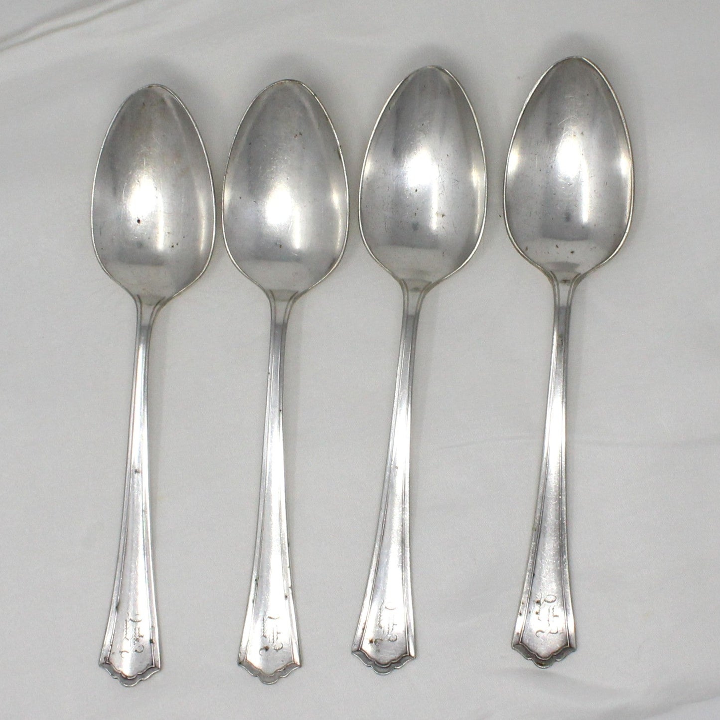 set of 4 antique spoons