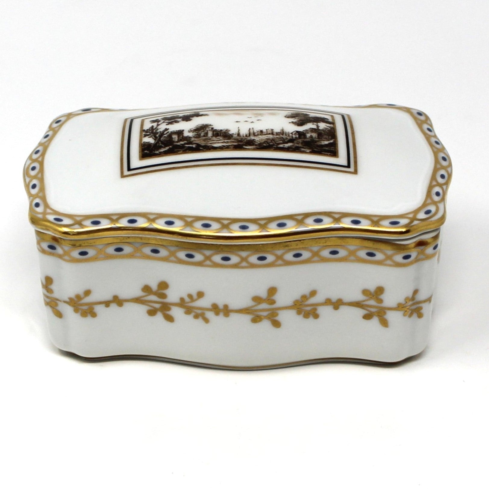Decorative porcelain white box by Ginori in the Fiesole pattern, with Italian villa scene on lid.  Gold accents on sides and rim.