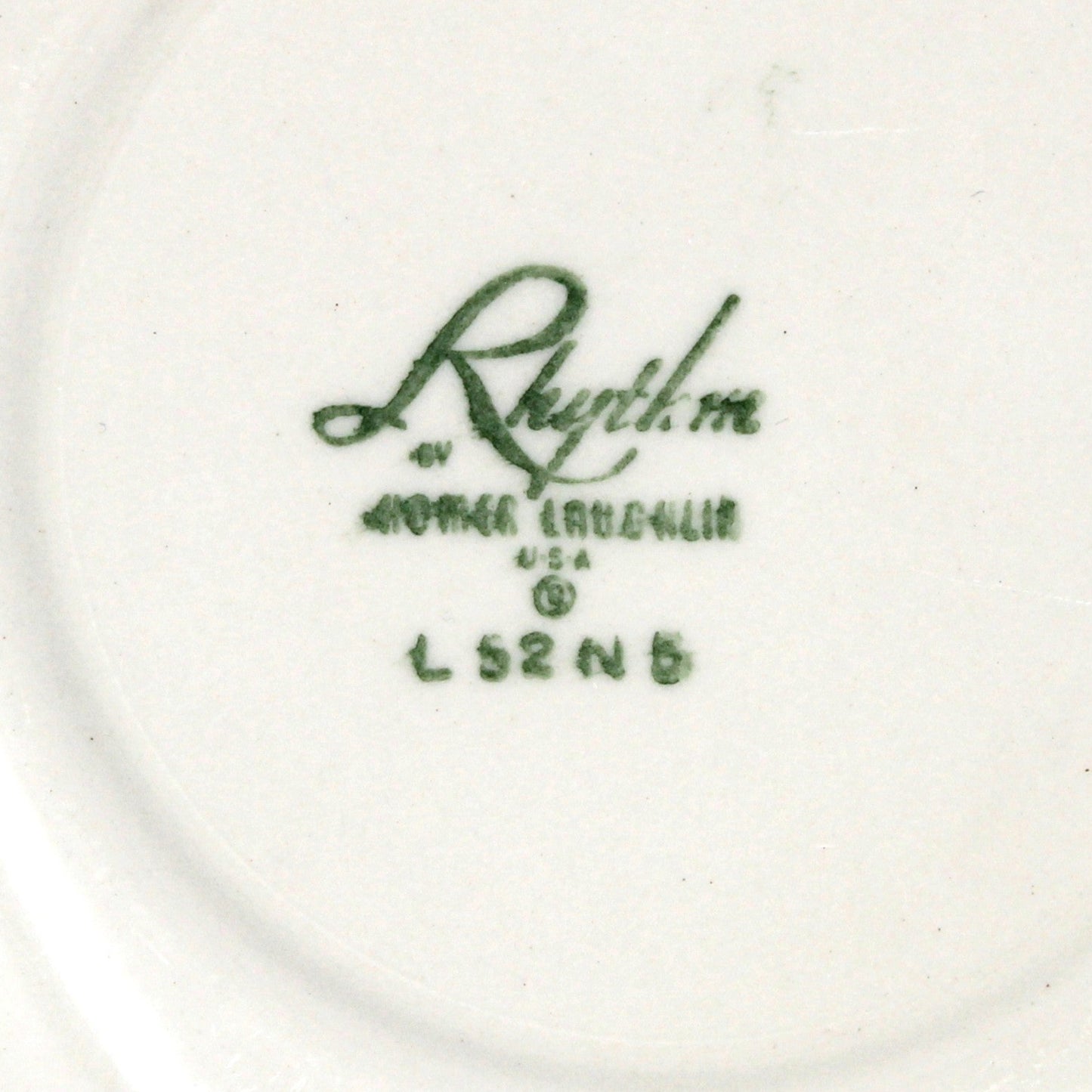 Vintage plate with 'Rhythm' branding by Homer Laughlin pottery