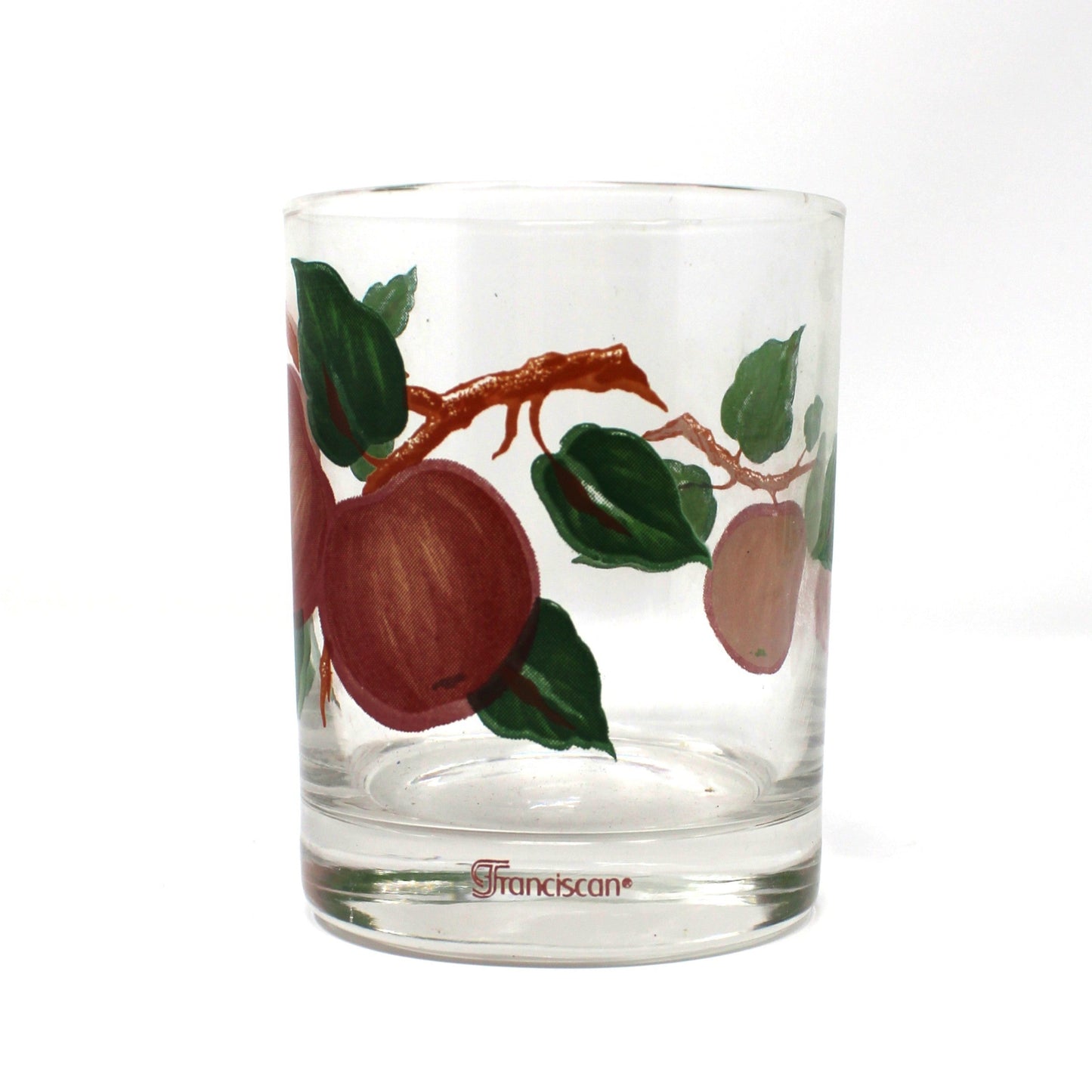 Clear glass with apple design, marked "Franciscan".