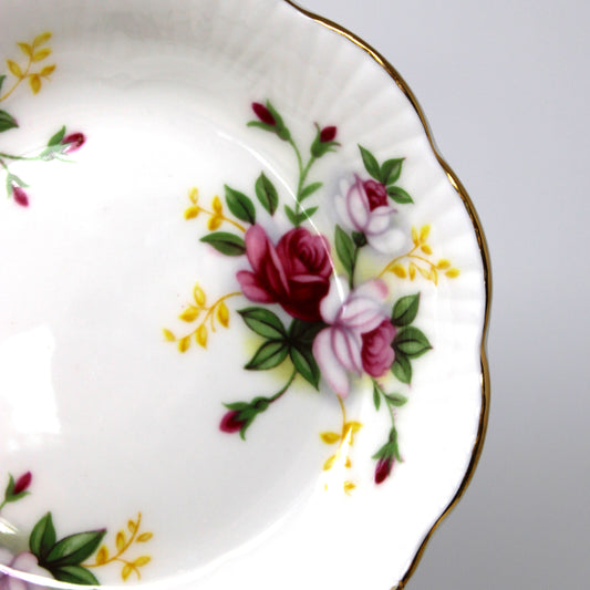 Decorative plate with floral design on a gray background