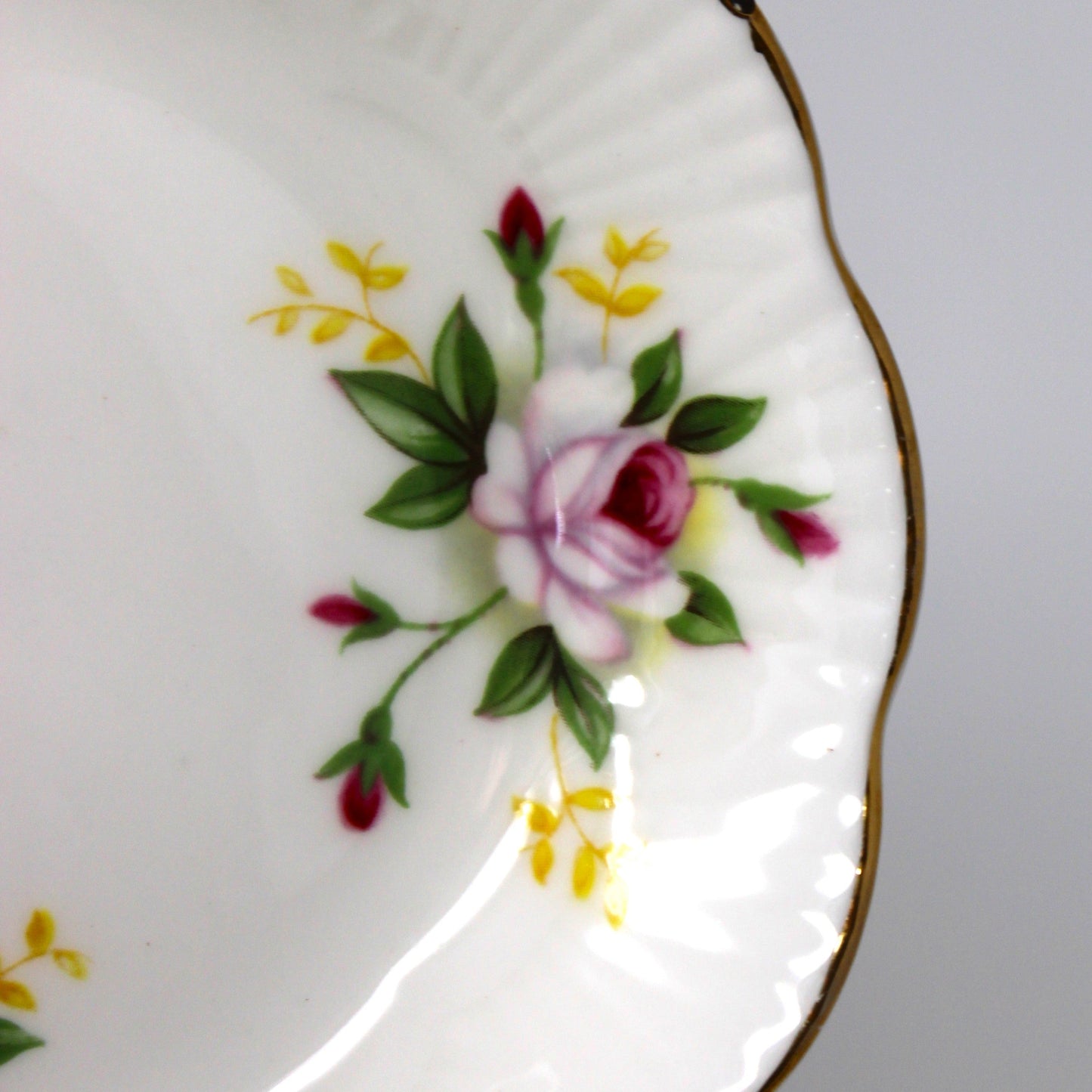 Decorative plate with floral design on a plain background