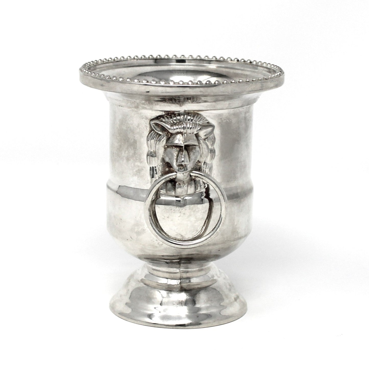 Silver candle holder with decorative ring on a white background