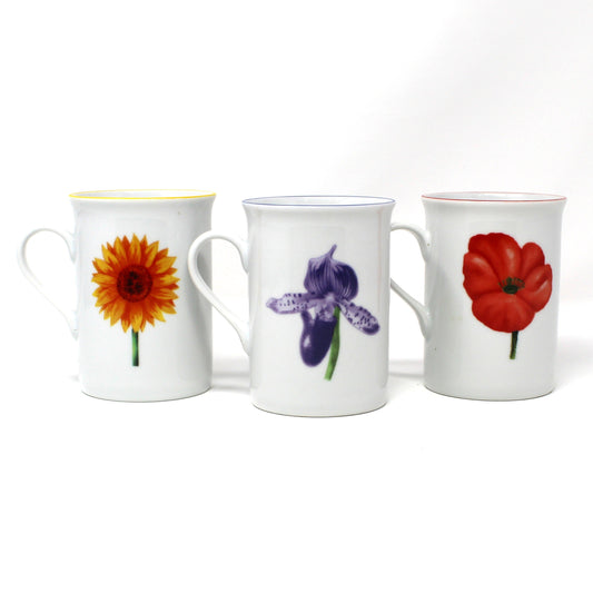 Back view of vintage floral mugs by Lillian Vernon.