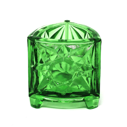 Green crystal container on a white background