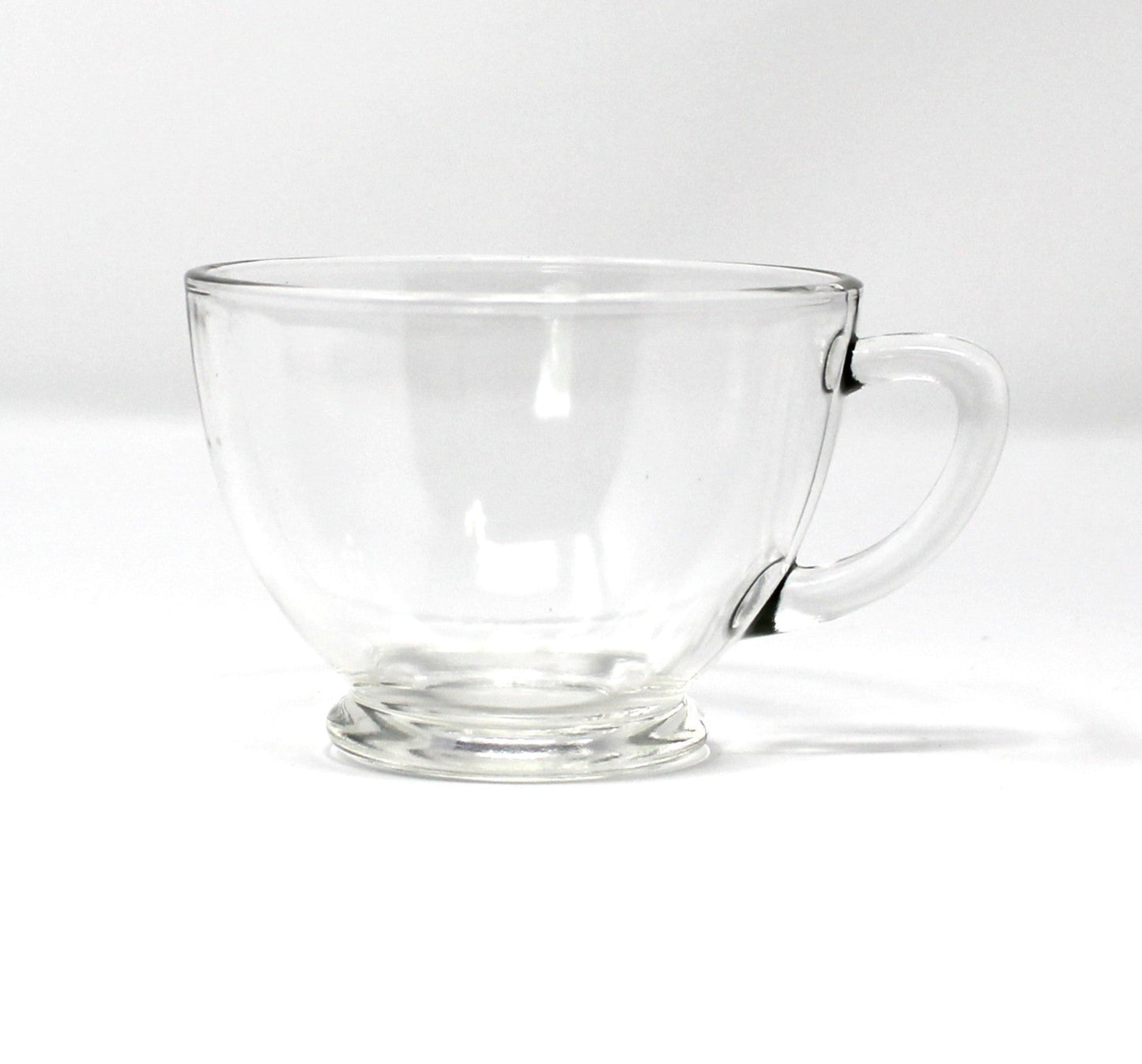 Clear glass cup from Snack Set by Anchor Hocking.