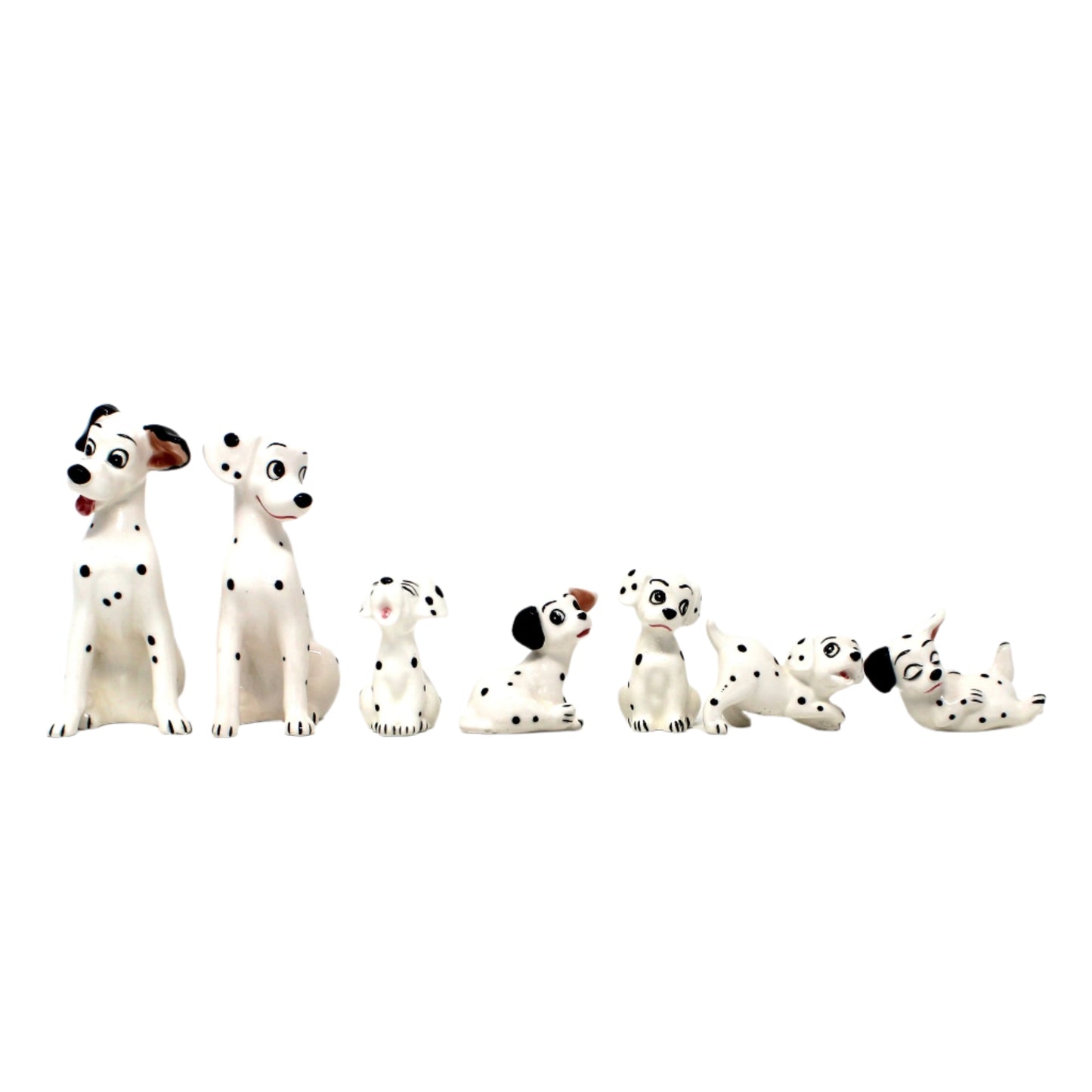 Set of 7 Vintage Disney 101 Dalmatians dog figurines.
