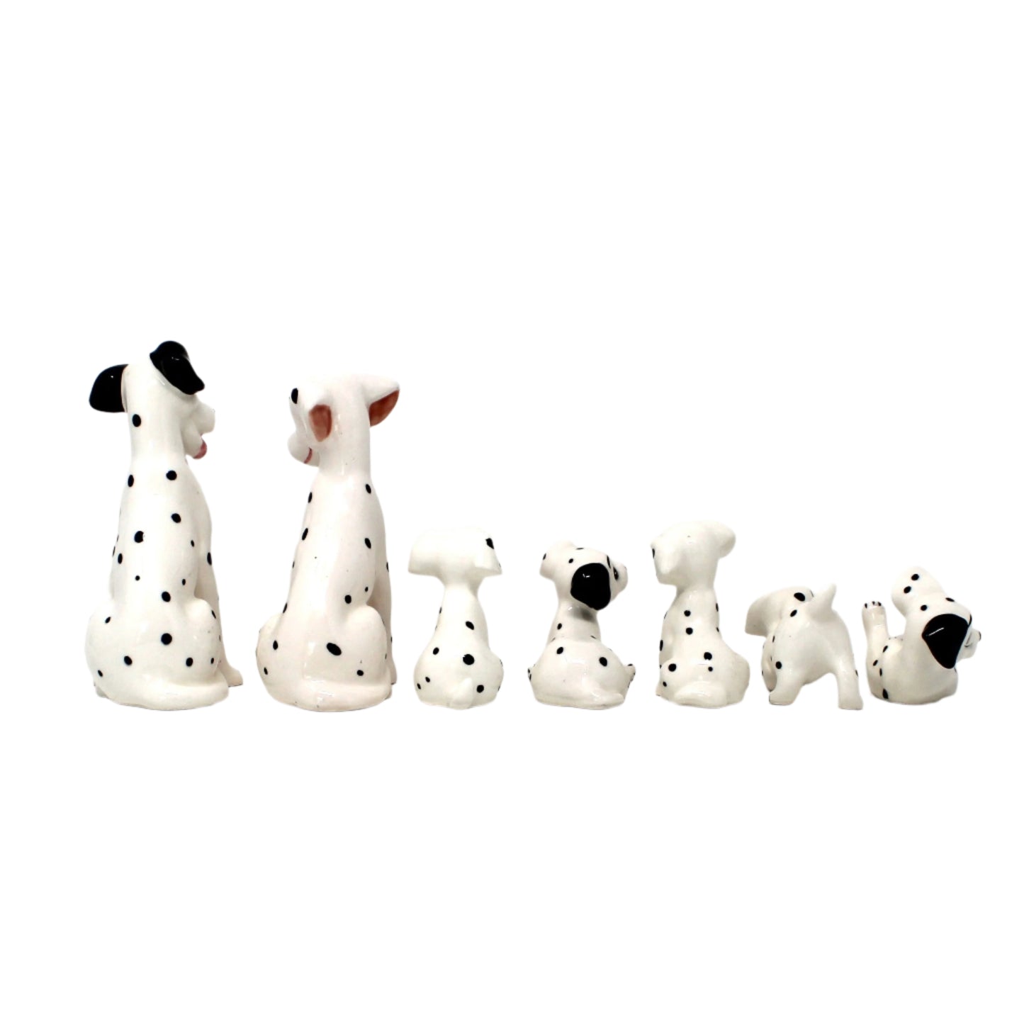Back view of Vintage Disney, 101 Dalmatians porcelain dog figurines. Japan