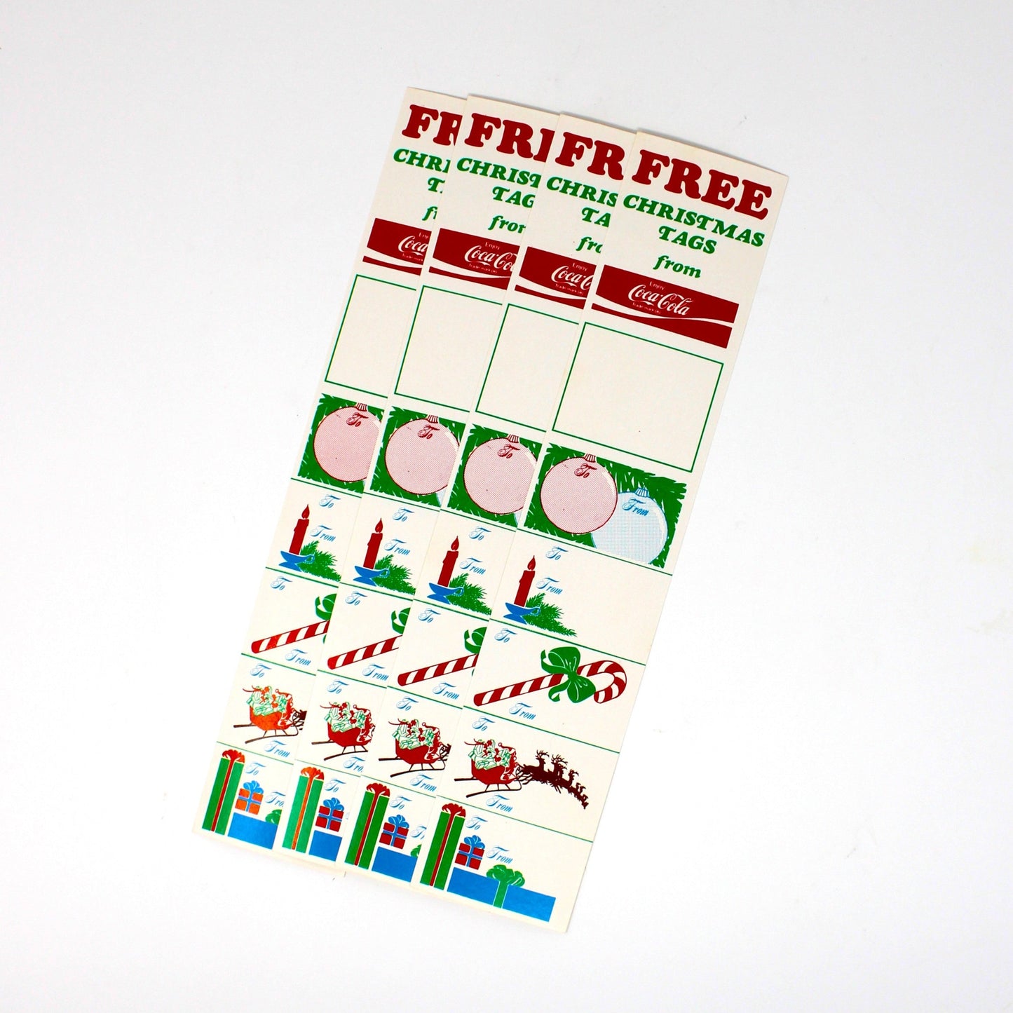 Colorful vintage Christmas gift tags. Promotional advertising item from Coca Cola.