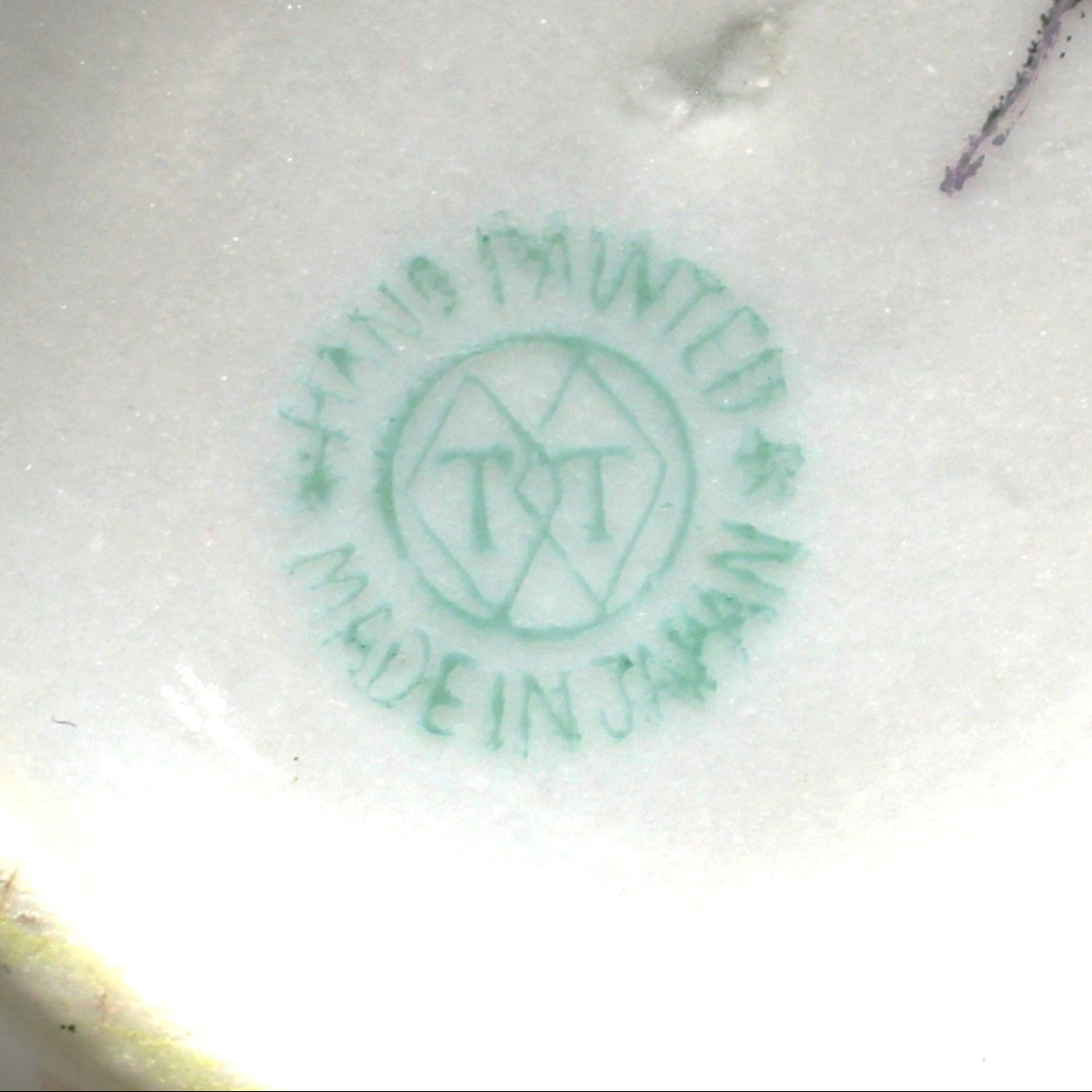 Close-up of backstamp on Takito Japan tea set, vintage porcelain, hand painted.