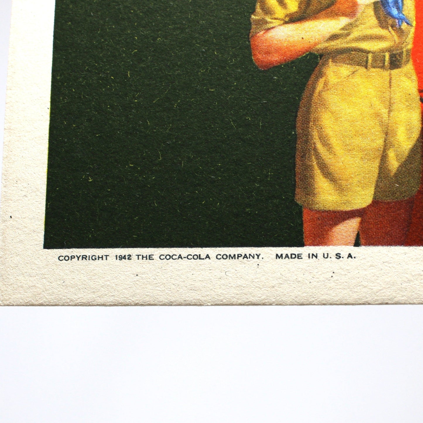 Vintage Coca-Cola advertisement ink blotter, marked copyright 1942, The Coca Cola Company, Made in USA.