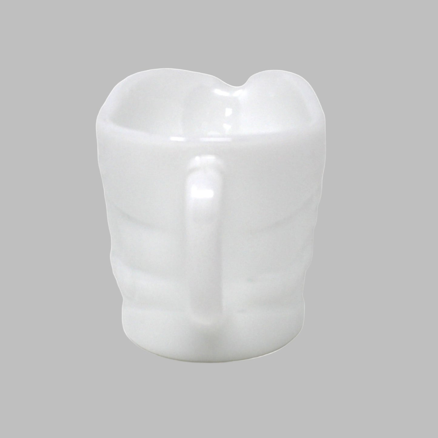 White ceramic mug on a white background