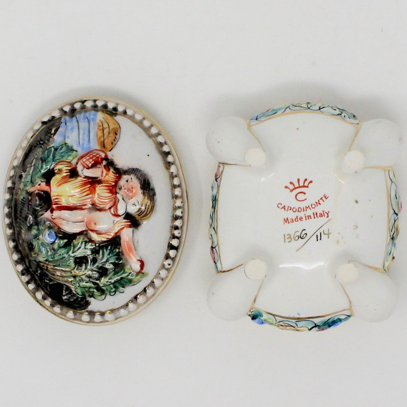 Capodimonte Italy porcelain trinket box. Hand Painted Putto