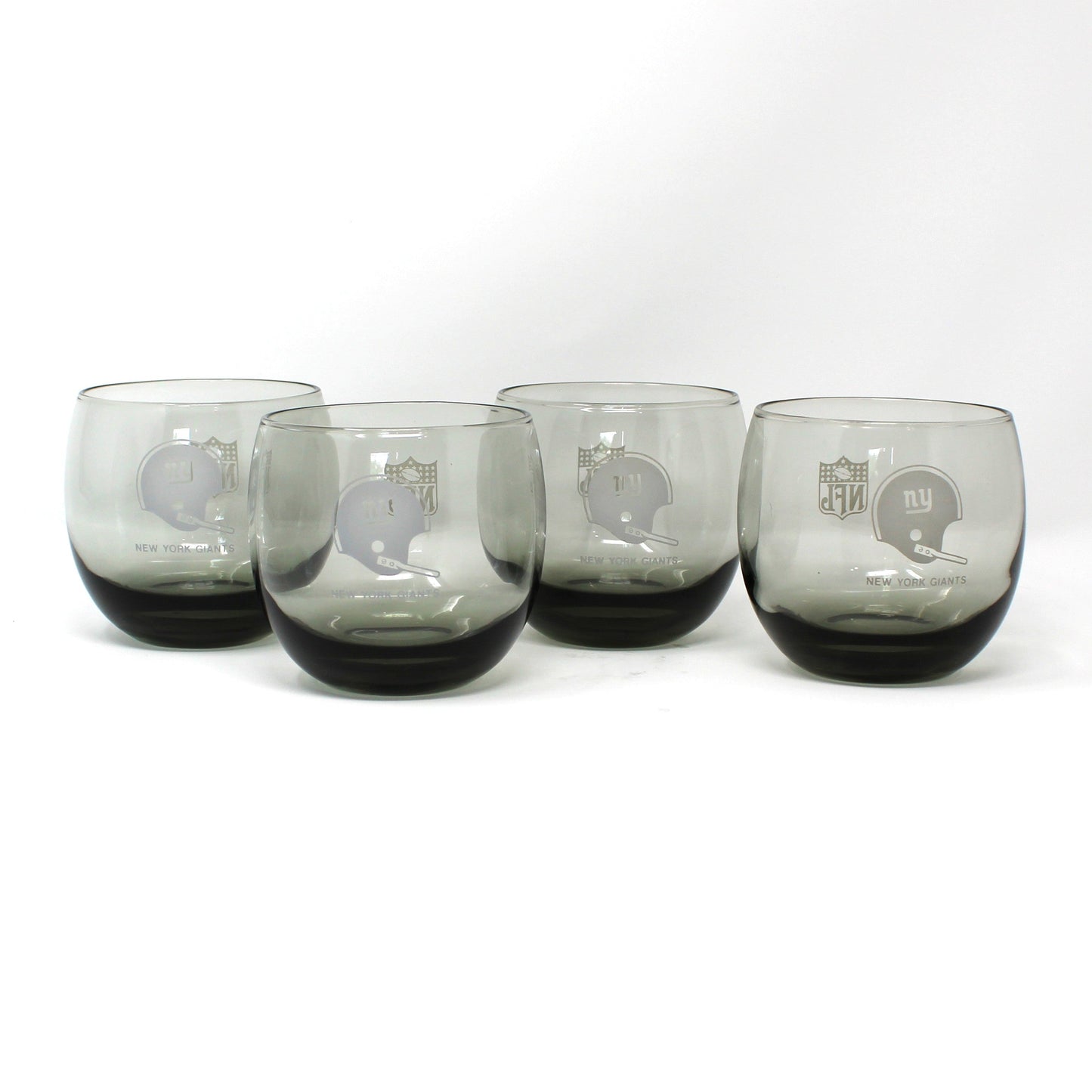 Vintage NFL football New York Giants roly-poly glasses. Smoke glass, sports barware.