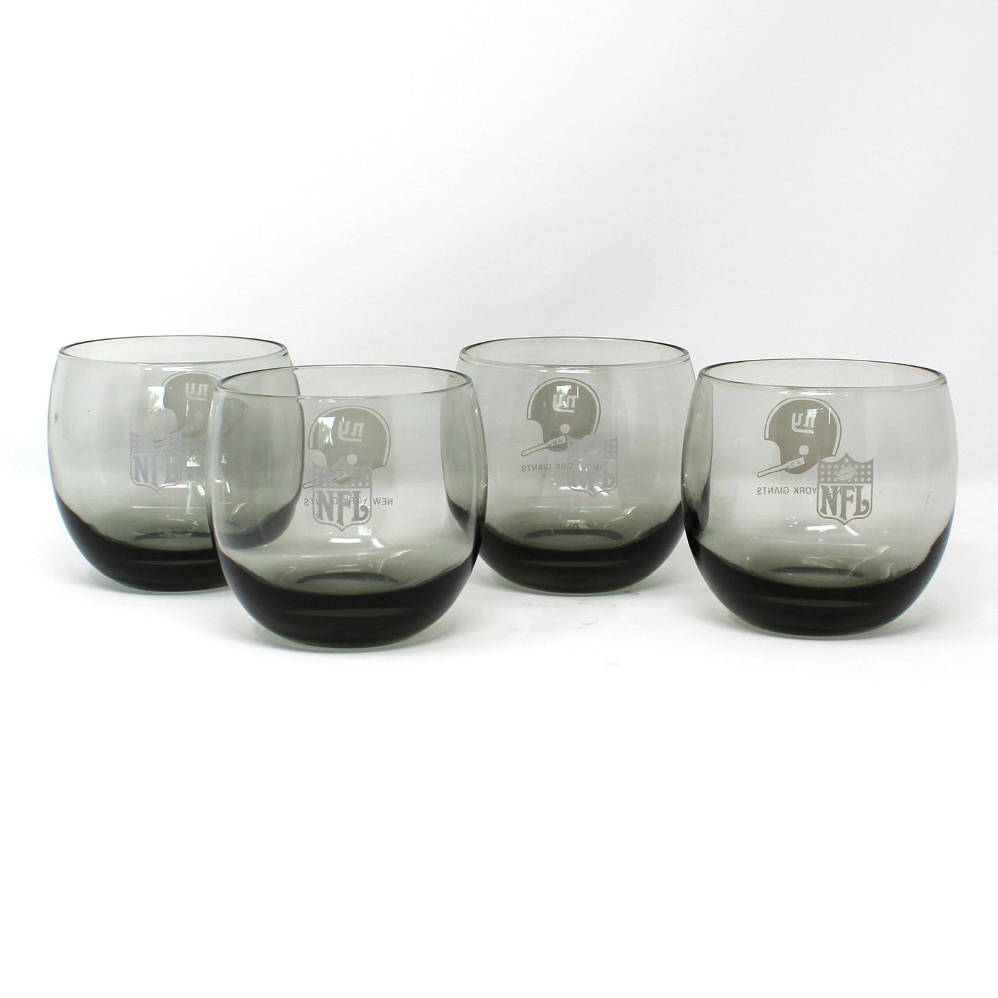 Vintage NFL football New York Giants roly-poly glasses. Smoke glass, sports barware.