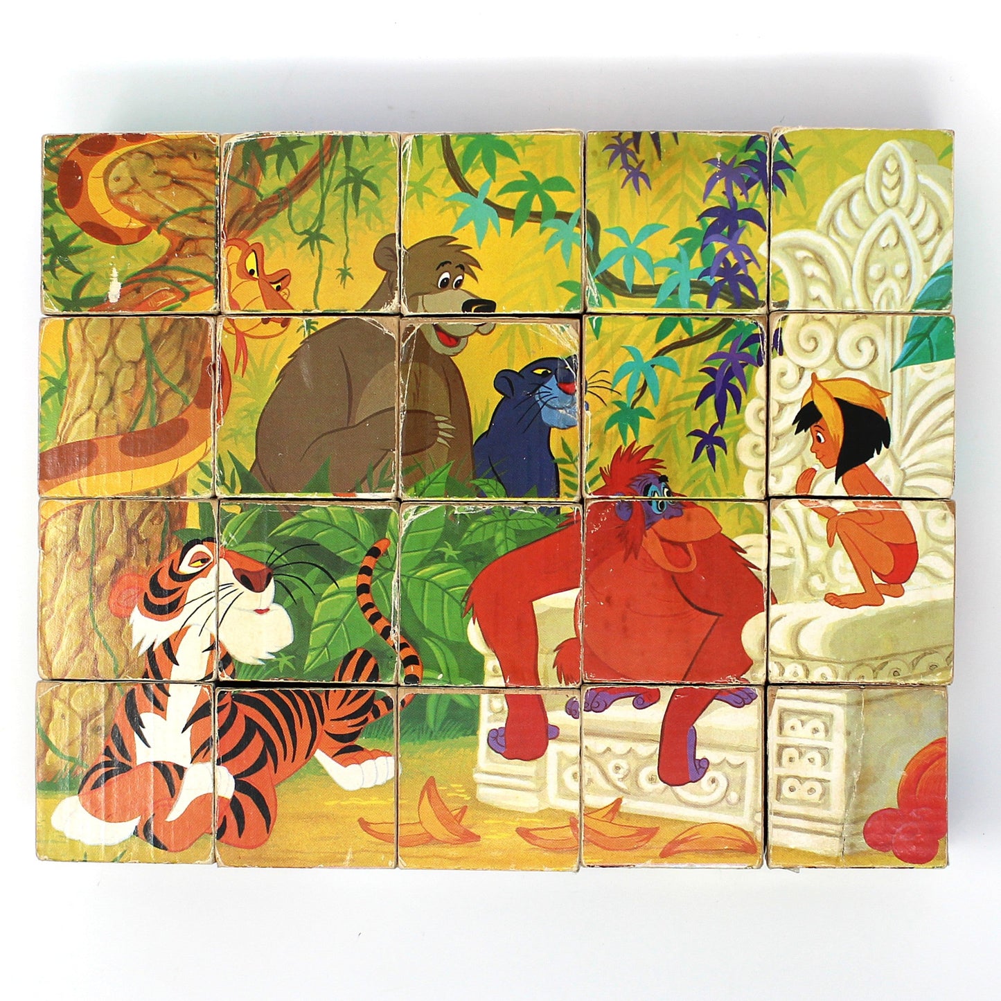Vintage children's wooden block puzzle with animated Disney characters from The Jungle Book.