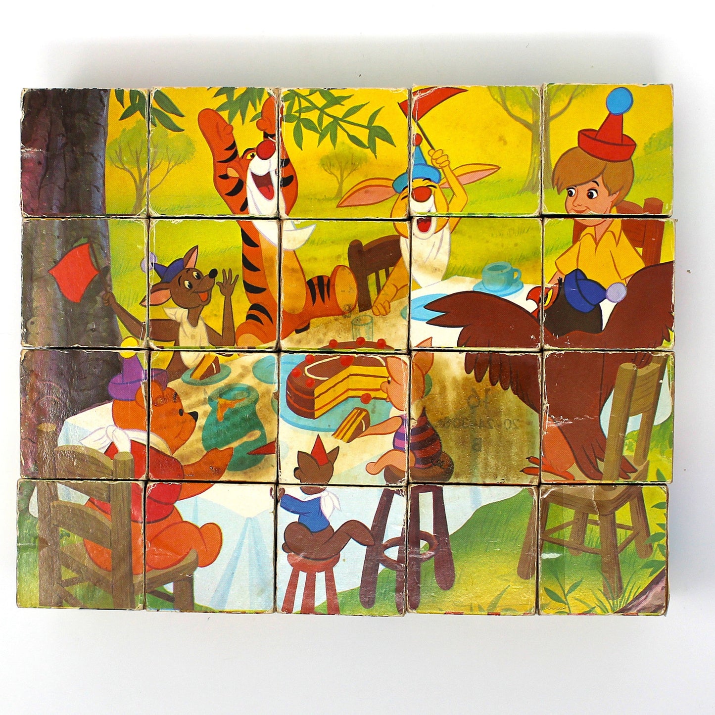 Vintage children's wooden block puzzle with animated Disney characters from Winnie The Pooh.