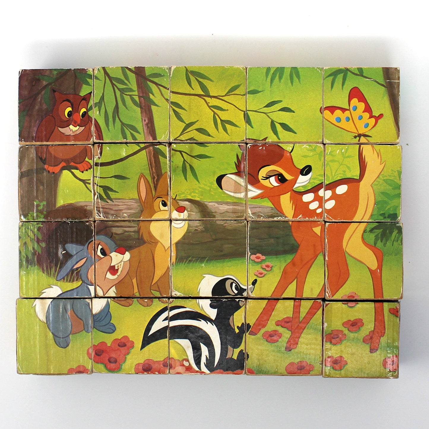 Vintage children's wooden block puzzle with animated Disney characters from Bambi.