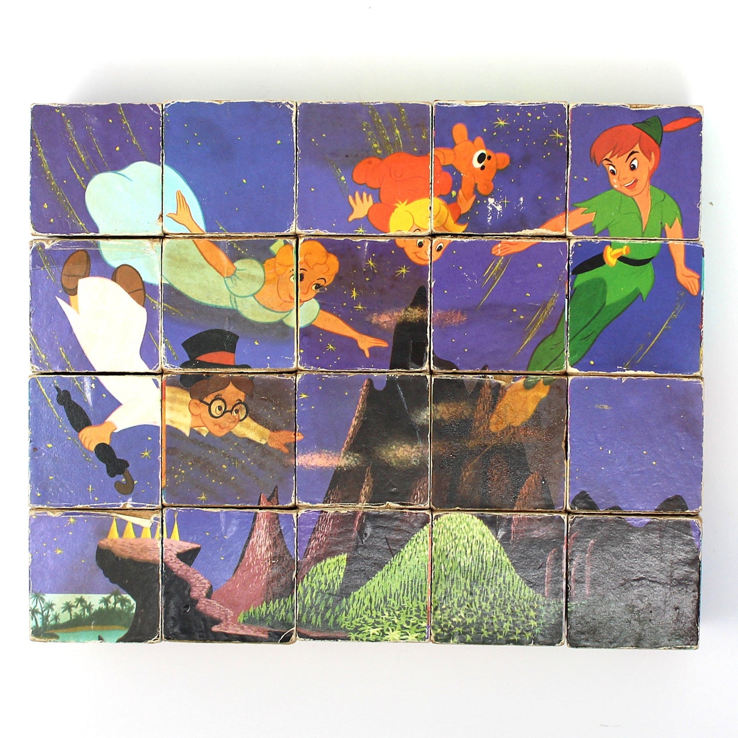 Vintage children's wooden block puzzle with animated Disney characters from Peter Pan.