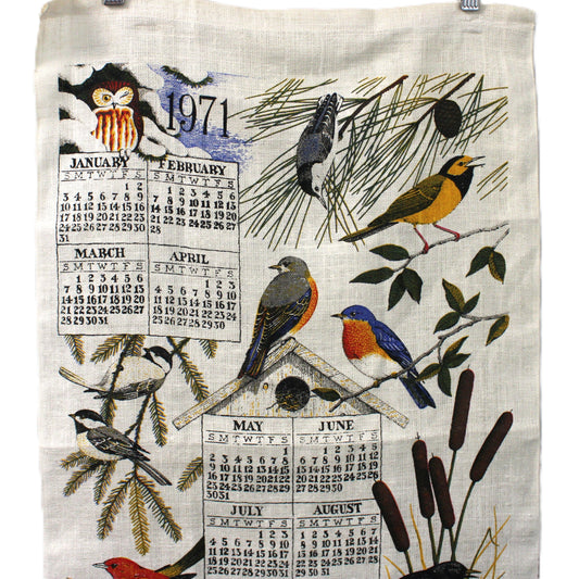 Vintage calendar Towel with bird design and calendar on a white background