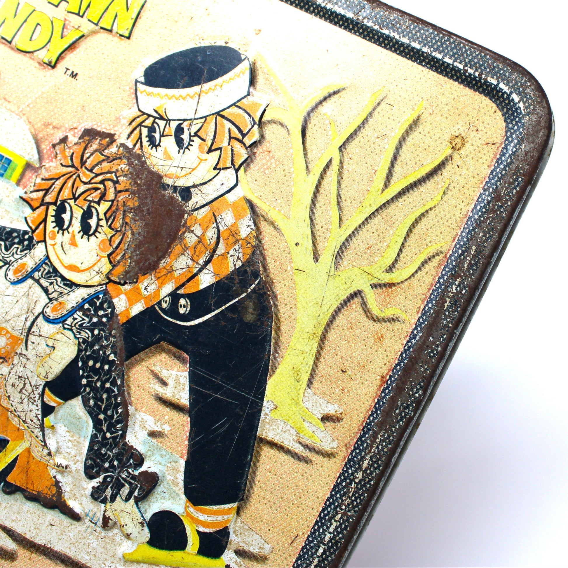 Vintage lunchbox with cartoon characters Raggedy Ann and Andy