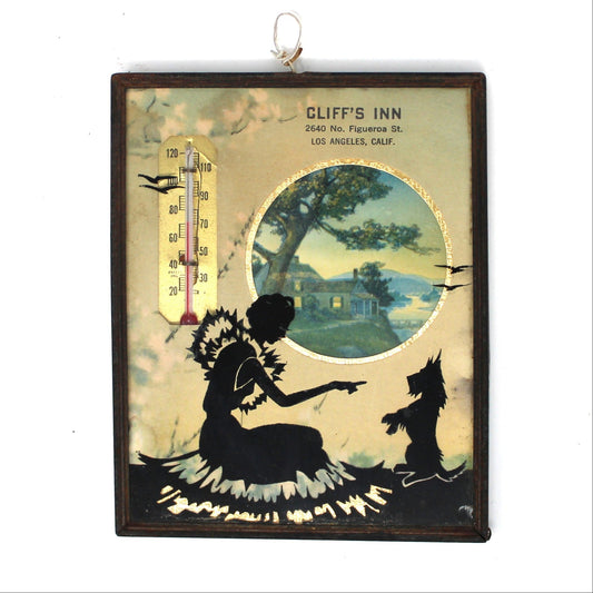 Vintage collectible Advertising Thermometer, with a silhouette of a lady and a dog with foil and a litho image of a house.