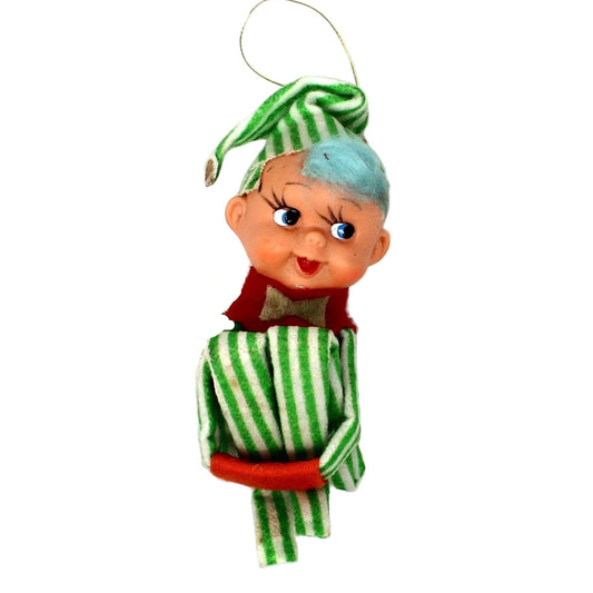 Vintage Christmas Knee Hugger Elf with green and white striped outfit and blue hair.