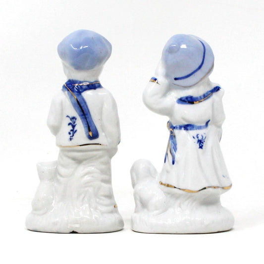 Figurine, Boy and Girl Holding Pets, Blue & White Porcelain, Hand Painted, Vintage Set of 2