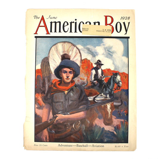 Vintage 1928 magazine cover titled 'The American Boy' from June 1928 with western themed drawing from artist Lawrence N. Wilbur.