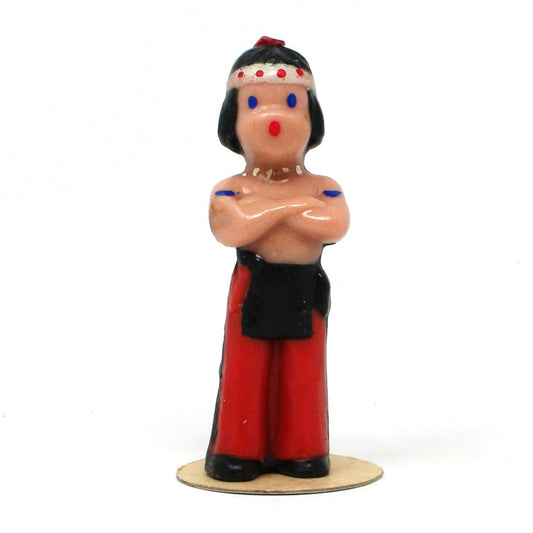 A vintage Gurley Novelty candle featuring an American Indian boy in red and black colors, never been burned.