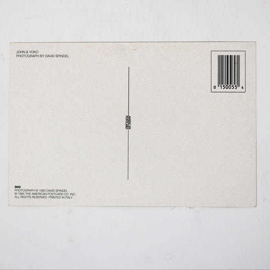 Back view of vintage postcard of John Lennon and Yoko Ono. Photo by David Spindel