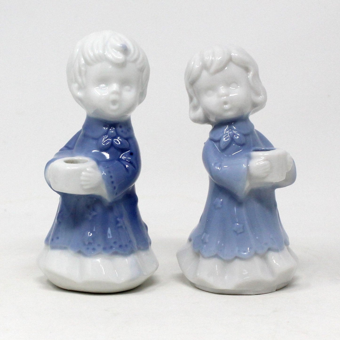 Two porcelain figures candle holders by Anderson.  blue and white porcelain children
