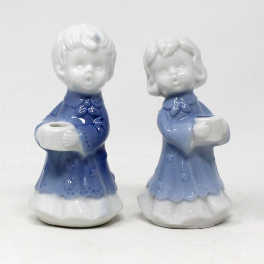Two porcelain figures candle holders by Anderson.  blue and white porcelain children