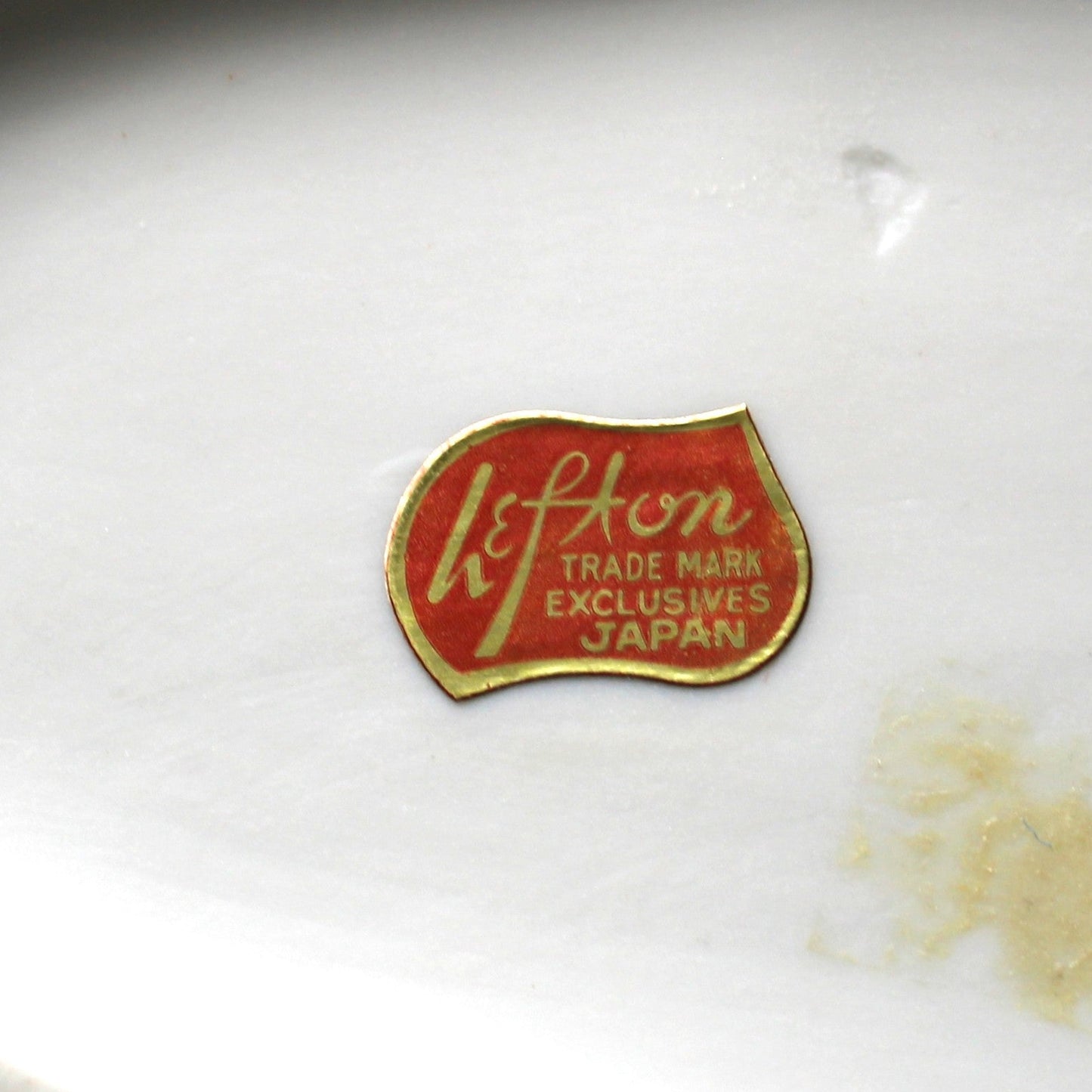 vintage Lefton foil sticker reads: Lefton Trade Mark Exclusives Japan