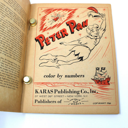 A vintage coloring book showing the inner cover with illustrated Peter Pan artwork and text reading 'Peter Pan' and 'Karas Publishing Co., Inc. Copyright 1961