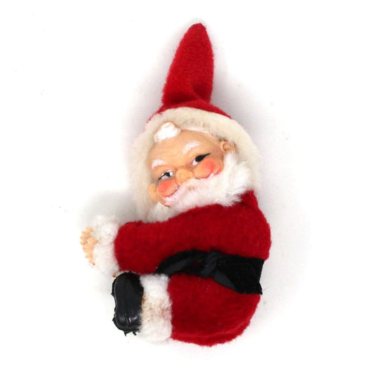 Vintage Christmas Santa Candle Hugger with flocked red outfit and pipe cleaner beard.