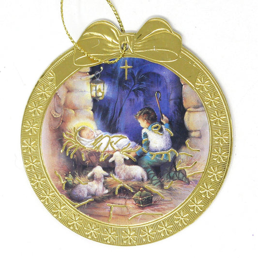 Vintage Die-Cut Christmas Ornament Artwork of Baby Jesus in a manger with a shepherd and lambs, within Golden Round Frame, Tree Trimmings, Holiday Tree Decor, Religious Collectible