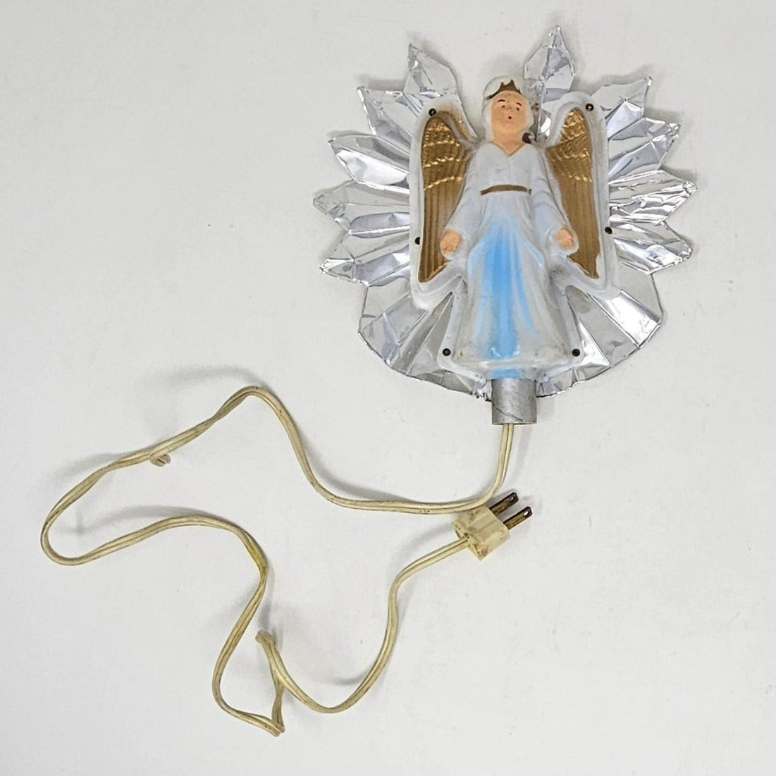 Decorative angel light with wings on a white background