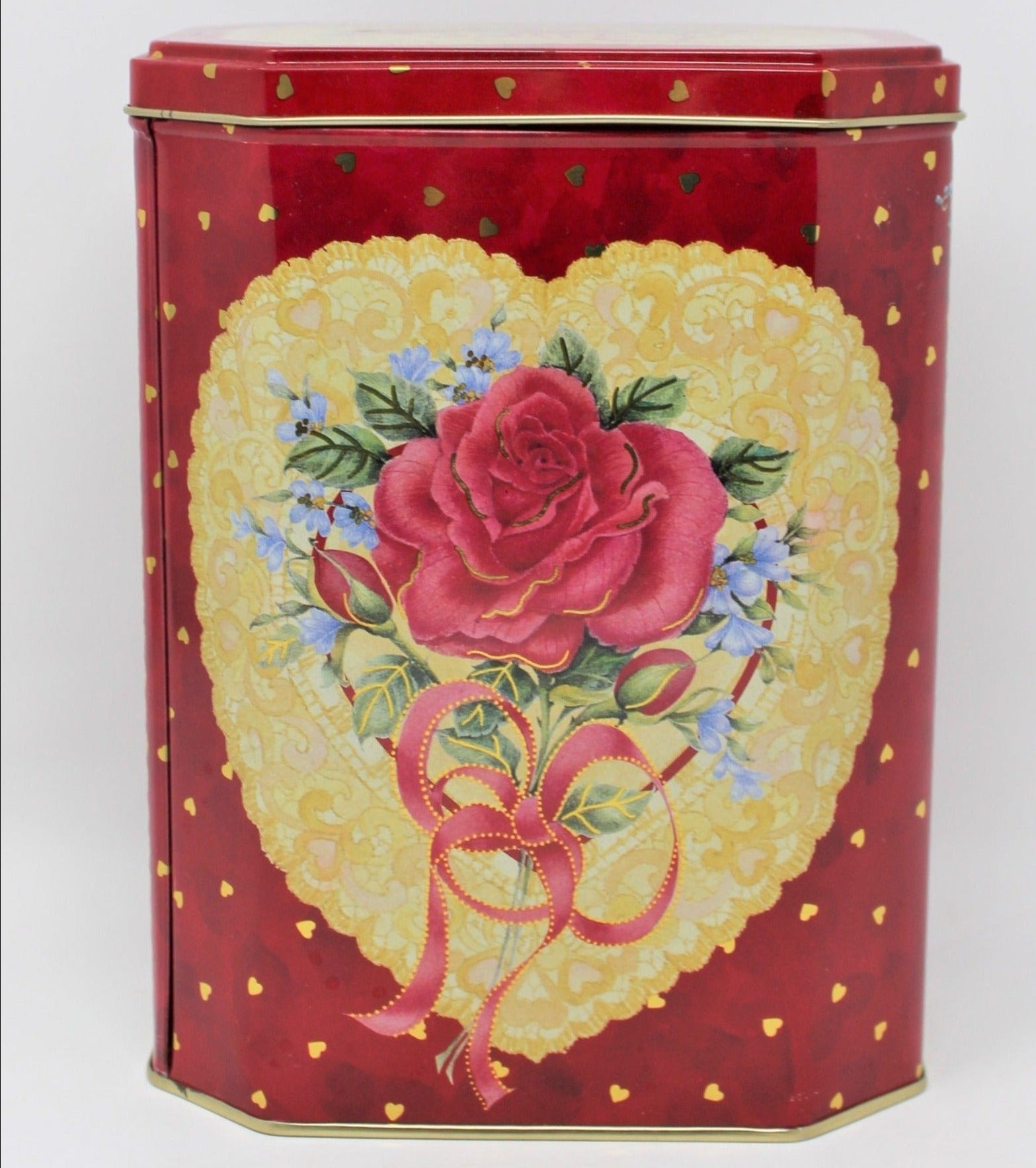Vintage collectible red tin with pink rose within a heart shaped design.  Gold hearts sprinkled all over. Storage Tin.