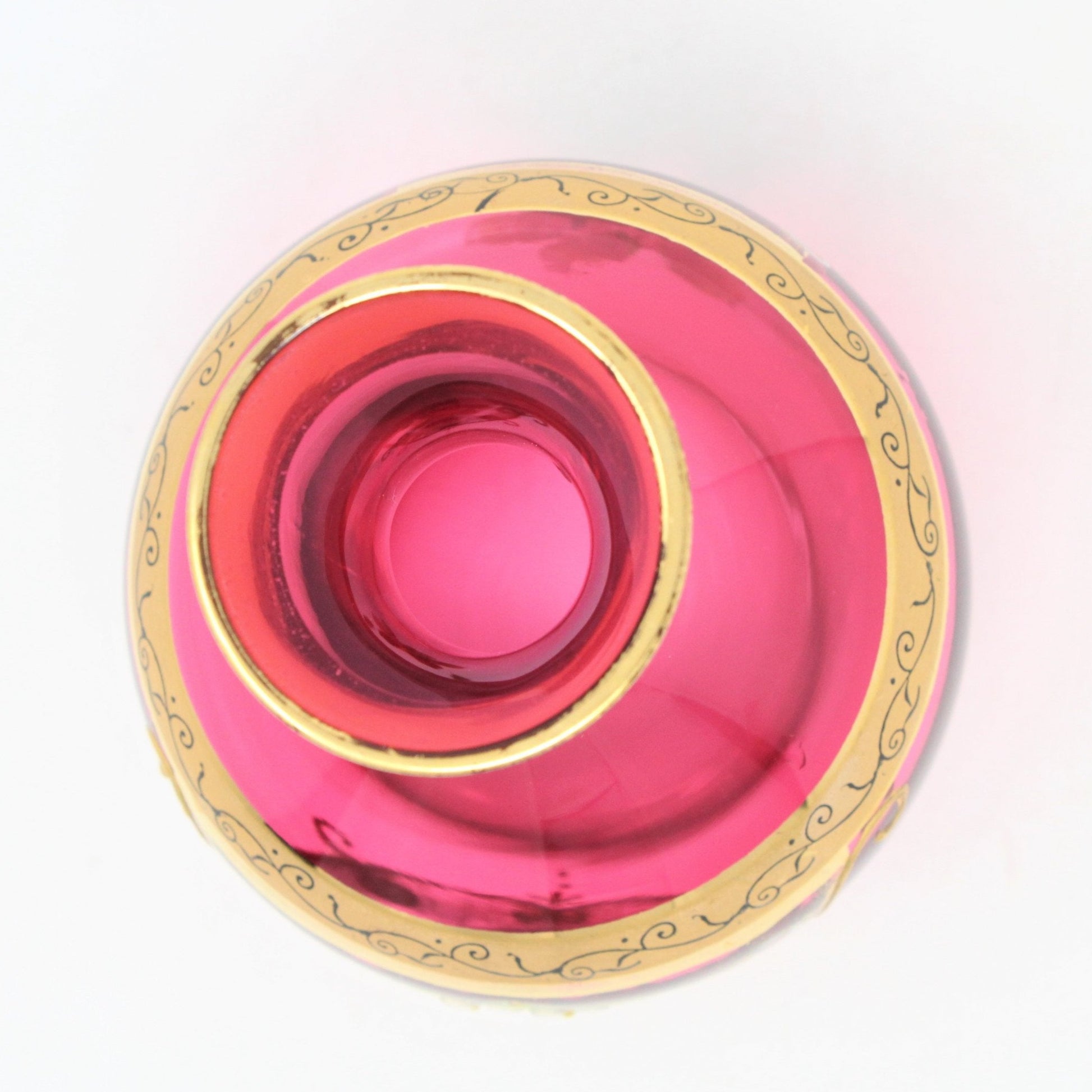 cranberry glass vase with gold accents