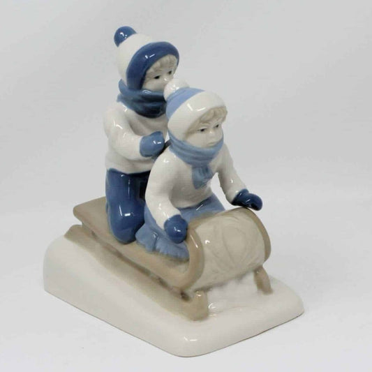 Figurine, Boy & Girl On Sled, Porcelana de Cuernavaca, Mexico, Vintage